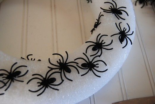 plastic spiders on wreath