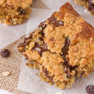 These Chocolate Chip Oatmeal Gooey Bars marry a gooey condensed milk filling, with a soft, oatmeal cookie dough. With plenty of chocolate chips for good measure!