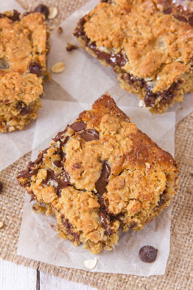 These Chocolate Chip Oatmeal Gooey Bars marry a gooey condensed milk filling, with a soft, oatmeal cookie dough. With plenty of chocolate chips for good measure! 