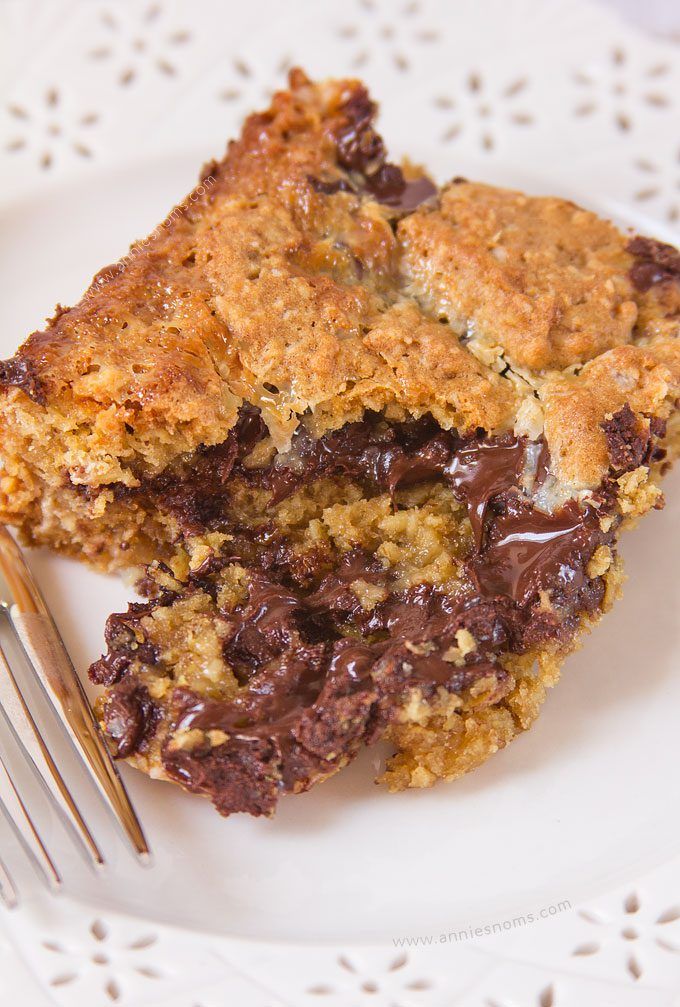 These Chocolate Chip Oatmeal Gooey Bars marry a gooey condensed milk filling, with a soft, oatmeal cookie dough. With plenty of chocolate chips for good measure! 