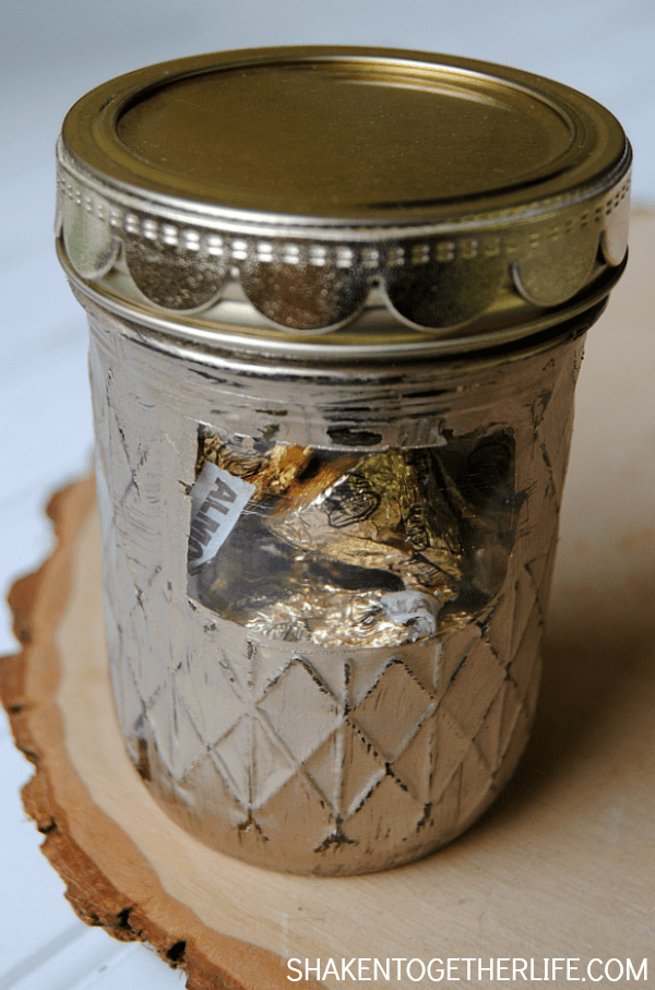 Peek-a-boo Mason Jar Candy Holders - love those little windows so you can see what is inside! Perfect for teacher gifts and Mothers Day!