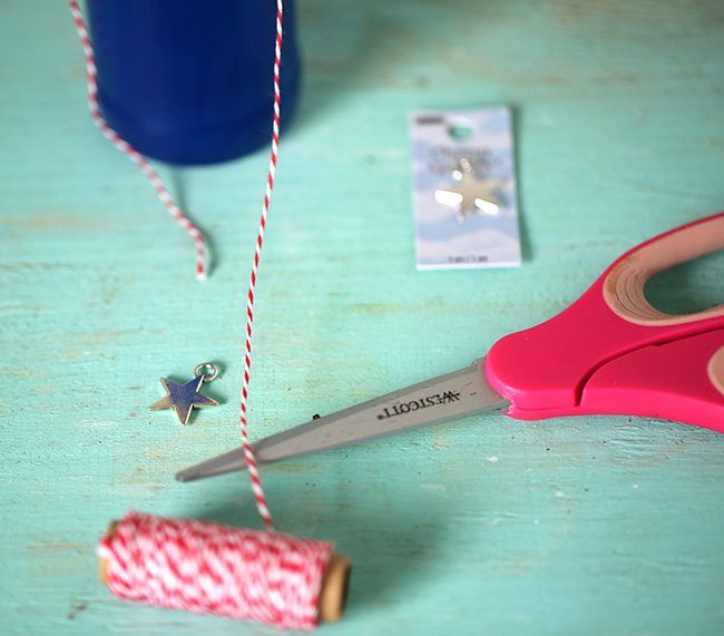 Make your own Red, White & Blue Glass Bottles with this DIY project.