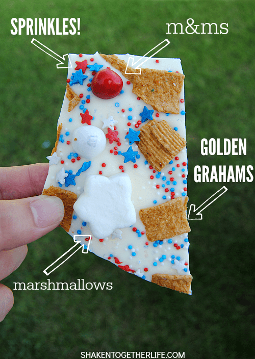 Packed with the classic of s'mores but all dressed up for the 4th of July, this Red, White & Blue S'mores Bark is SO festive and easy to make!