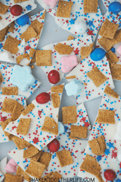 Packed with the classic flavors of s'mores but all dressed up for the 4th of July, this Red, White & Blue S'mores Bark is SO festive and easy to make!