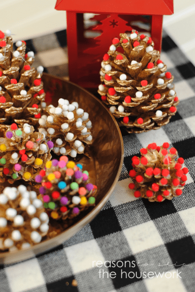These Pom Pom Pinecones are the perfect Christmas Decoration that the whole family can help make!