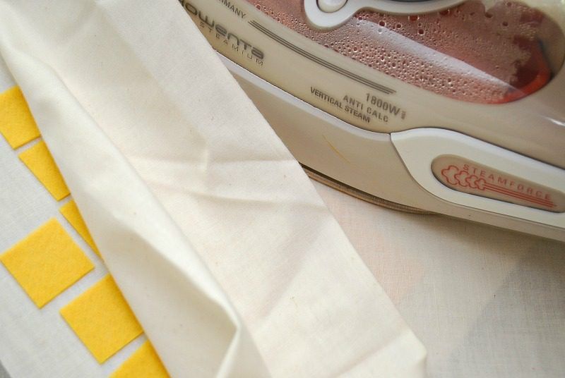 Iron your felt squares to make an Embroidery Hoop Pineapple 