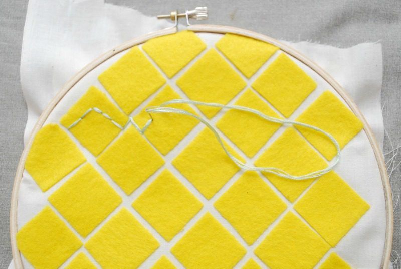 You can embroider on top of the felt squares of your Embroidery Hoop Pineapple