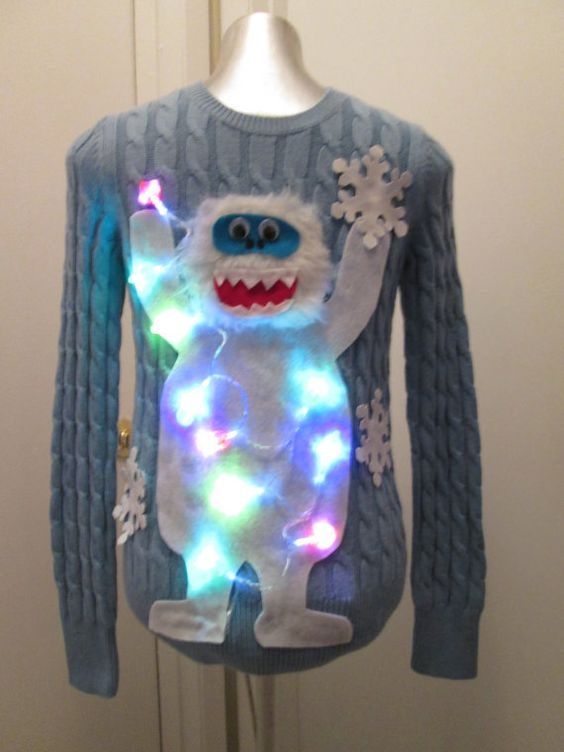 Abominable Snowman Sweater: If you are attending an ugly Christmas sweater party this year, we have got you covered! Here are 25 Ugly Christmas Sweater Ideas for you to use as inspiration.