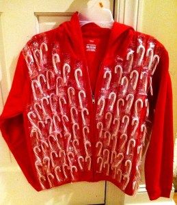 Candy Cane Sweater: If you are attending an ugly Christmas sweater party this year, we have got you covered! Here are 25 Ugly Christmas Sweater Ideas for you to use as inspiration.