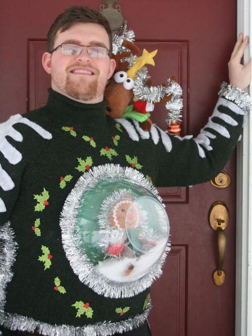 Snow Globe: If you are attending an ugly Christmas sweater party this year, we have got you covered! Here are 25 Ugly Christmas Sweater Ideas for you to use as inspiration.