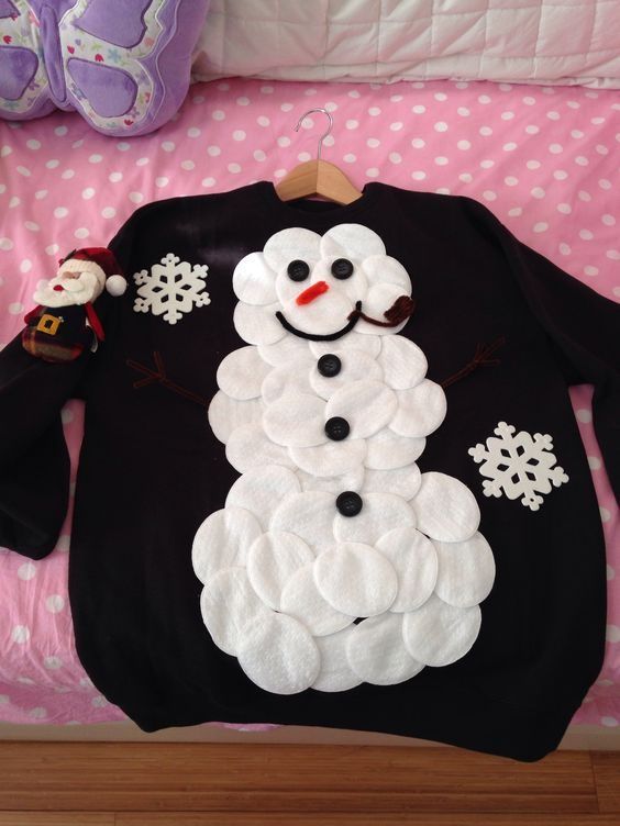 Snowman Sweater: If you are attending an ugly Christmas sweater party this year, we have got you covered! Here are 25 Ugly Christmas Sweater Ideas for you to use as inspiration.