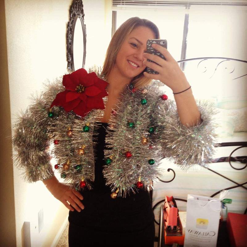 Tinsel Sweater: If you are attending an ugly Christmas sweater party this year, we have got you covered! Here are 25 Ugly Christmas Sweater Ideas for you to use as inspiration.