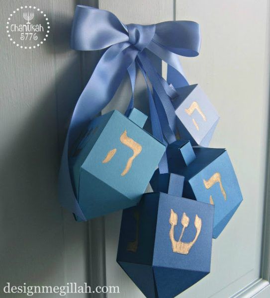 Dreidel Door Hanging: Make your own Hanukkah crafts or get the whole family involved with one of these 10 Hanukkah Crafts