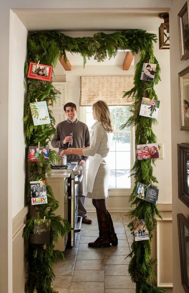 green garland door frame card display