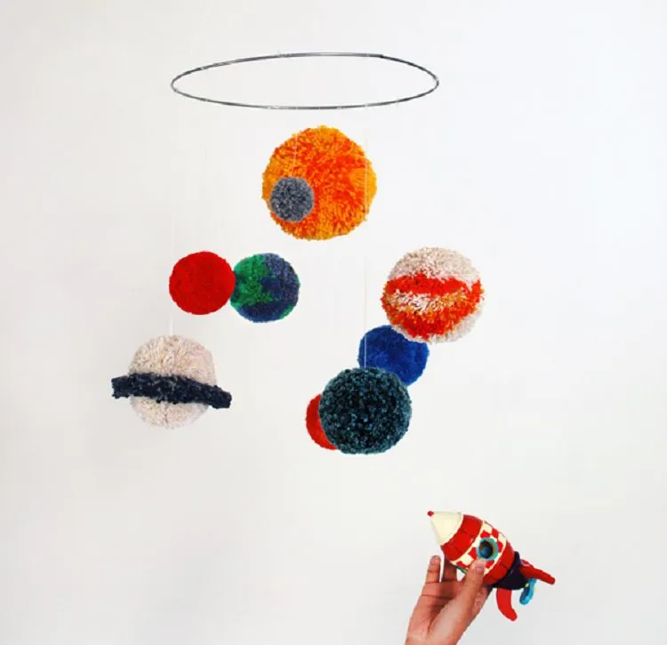 A Planet Mobile Made Entirely of Pom Poms