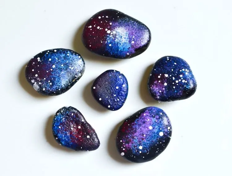 Space inspired rocks with blue and and violet colors 
