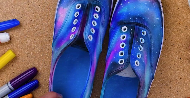 DIY Space-Inspired Projects: Space-Inspired Shoes on a wooden background