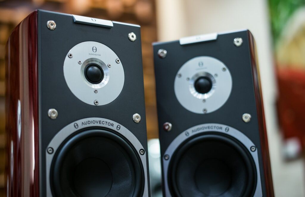 two amplifier speakers side by side