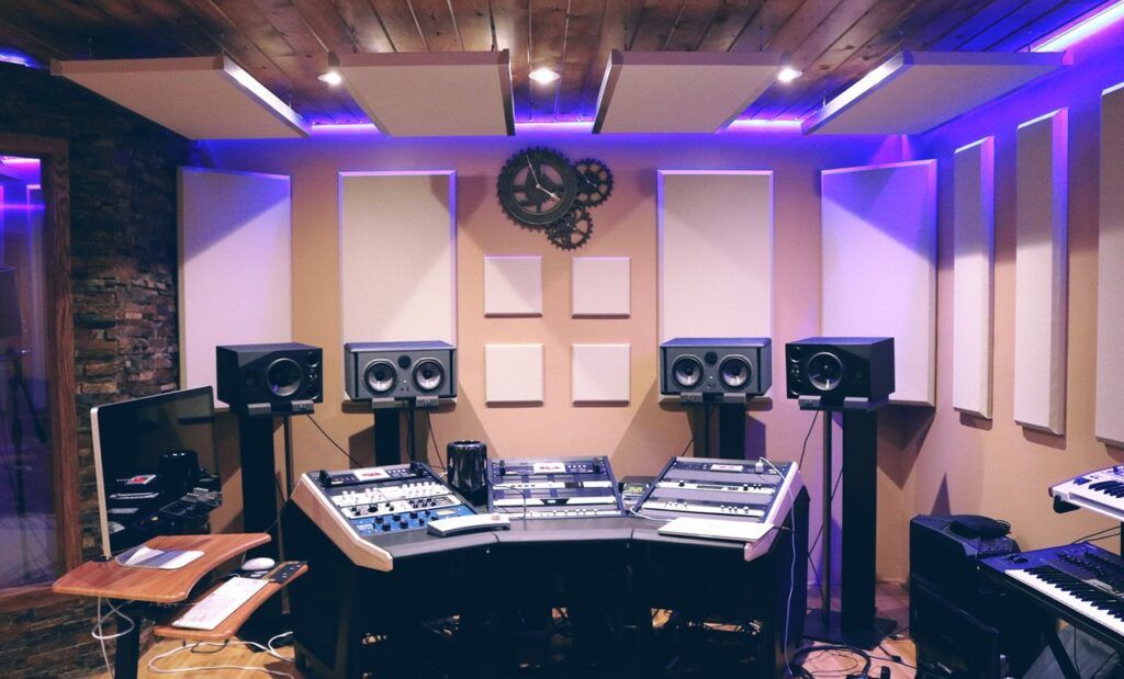 speakers and gadgets set up in recording studio