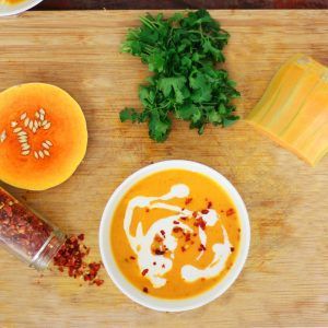 a bowl of butternut soup cooked using the best soup recipes