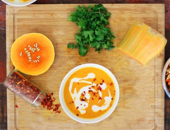 a bowl of butternut soup cooked using the best soup recipes
