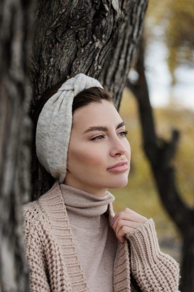 A woman wearing a headband