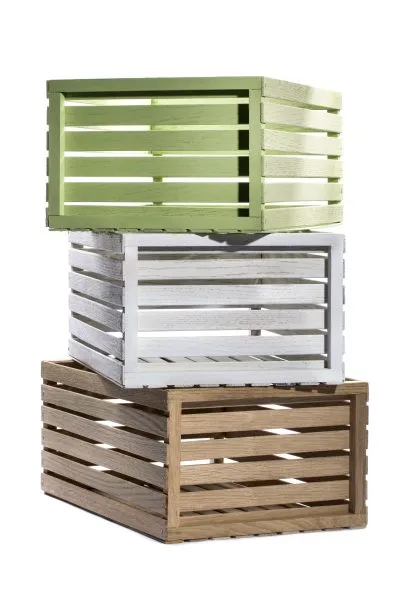 Multicolored boxes of wooden slats on a white background